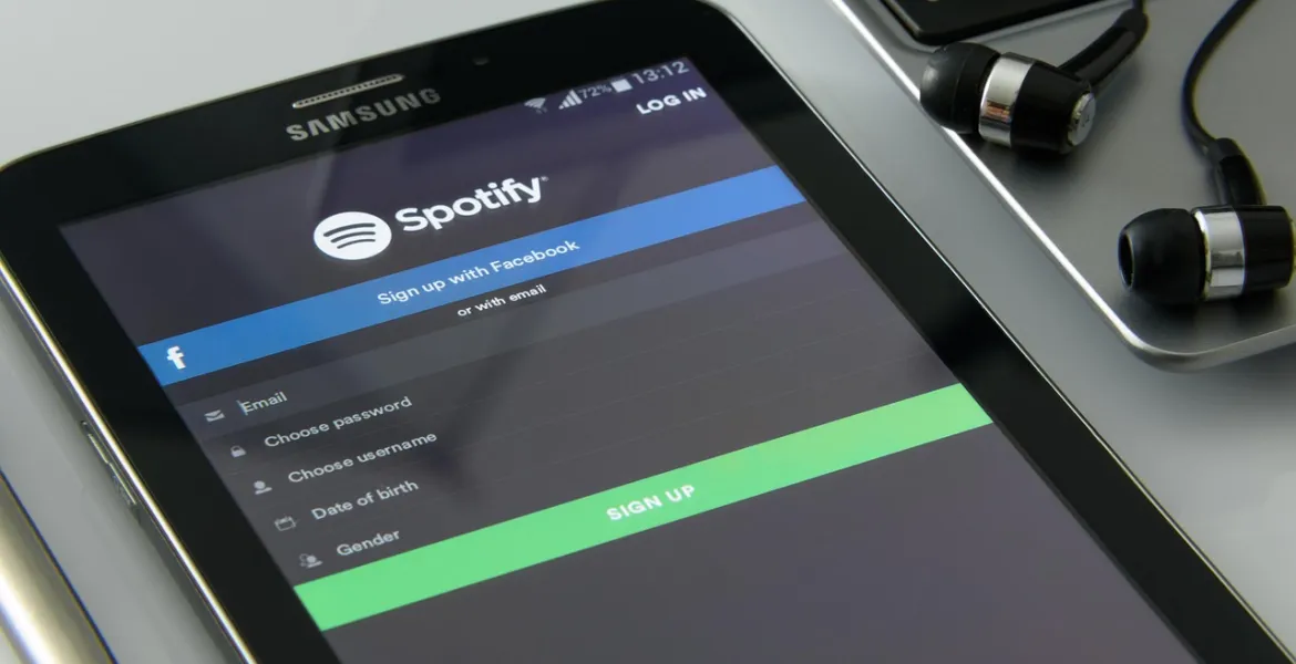 Crollo delle Azioni Spotify: Ricavi deludenti e Previsioni Nere