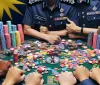 Scandalo in Malesia: Poliziotti accusati di vorruzione nel gioco d'azzardo